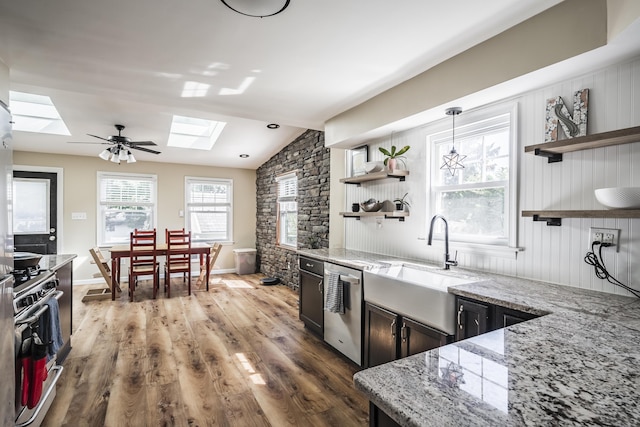 631 Main St, Tatamy, PA 18085 - kitchen featuring a skylight, open shelves, stainless steel appliances, a sink, and vaulted ceiling