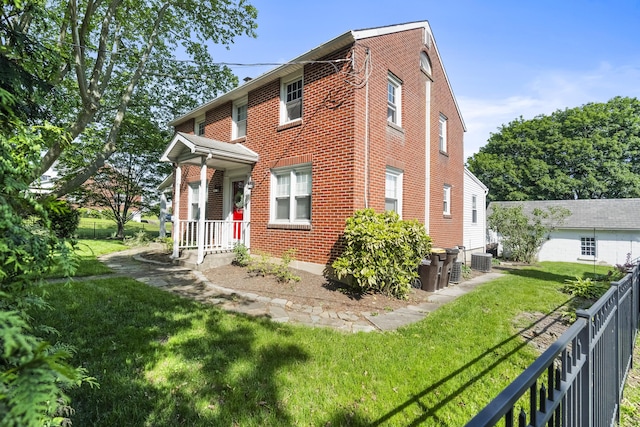 631 Main St, Tatamy, PA 18085 - view of front of house with brick siding and cooling unit