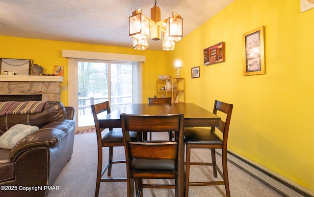 dining room with carpet floors, a baseboard radiator, an inviting chandelier, a stone fireplace, and a textured ceiling