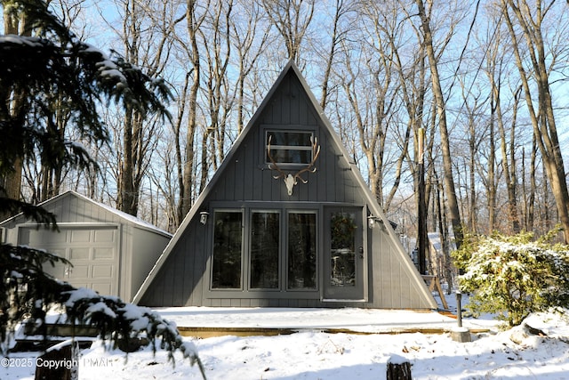 view of front of house featuring an outbuilding and a garage