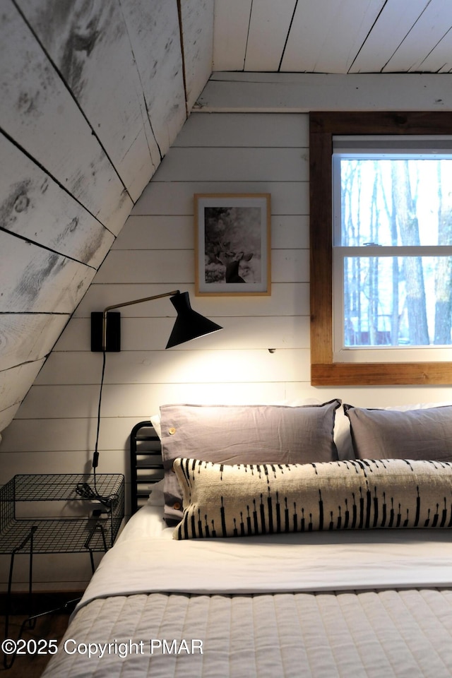 bedroom featuring lofted ceiling