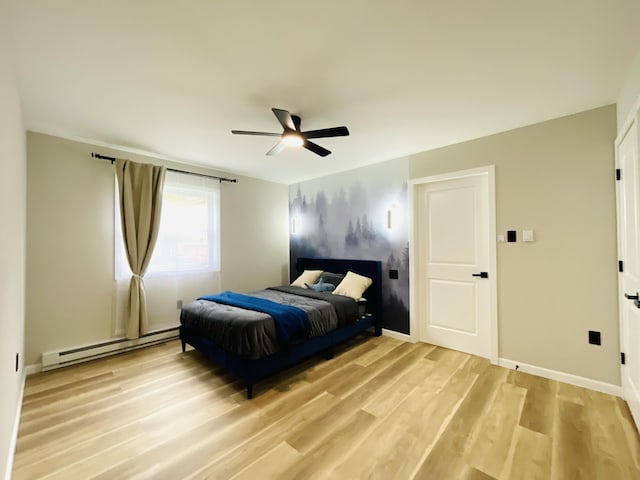 1216 Winding Way, Tobyhanna, PA 18466 - bedroom with a baseboard radiator, light wood-type flooring, and a ceiling fan