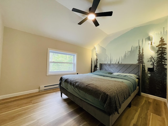 1216 Winding Way, Tobyhanna, PA 18466 - bedroom featuring a baseboard heating unit, light wood-style floors, lofted ceiling, and ceiling fan