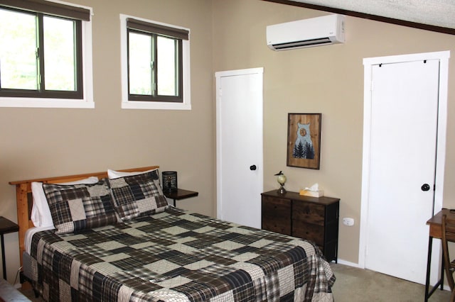 248 High Pass Way, Tannersville, PA 18372 - carpeted bedroom with a wall mounted air conditioner and lofted ceiling
