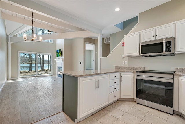 134 Laurel Hill Dr Unit 102, Greentown, PA 18426 - kitchen with white cabinets, appliances with stainless steel finishes, a chandelier, a peninsula, and open floor plan