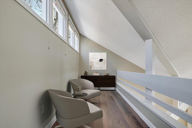 134 Laurel Hill Dr Unit 102, Greentown, PA 18426 - sitting room with baseboards, a textured ceiling, and wood finished floors