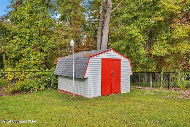 view of shed featuring a fenced backyard