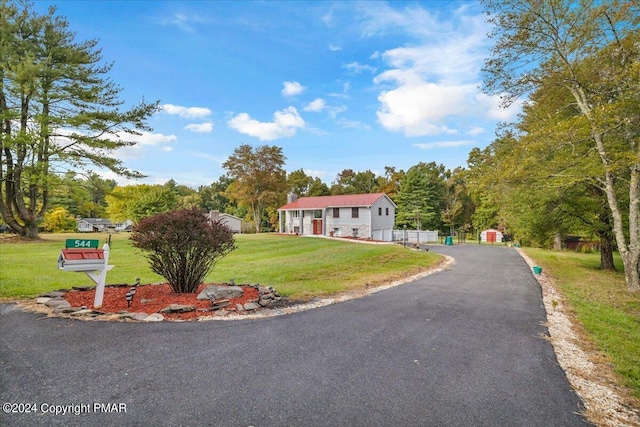 view of front of home featuring a front lawn