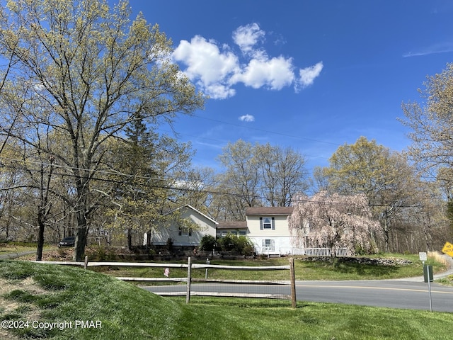 view of front of property with a front lawn