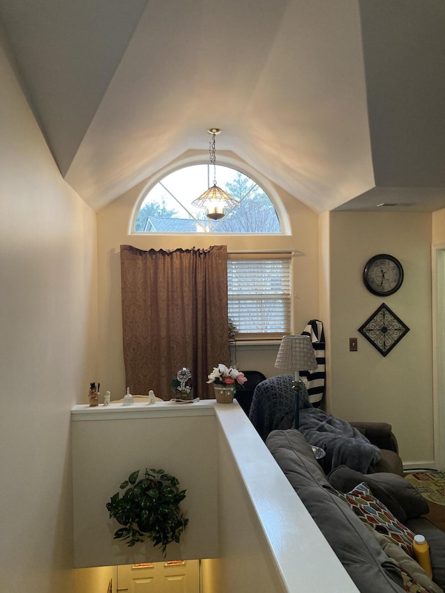 bedroom with lofted ceiling