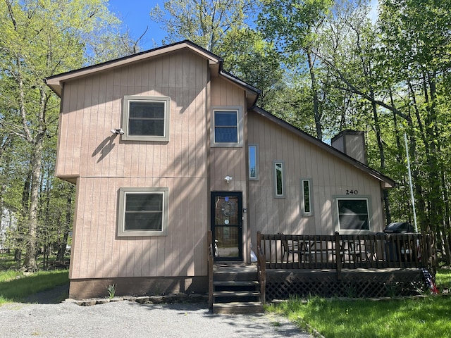 1076 Knollwood Dr, Tobyhanna, PA 18466 - view of front of property with a chimney and a deck
