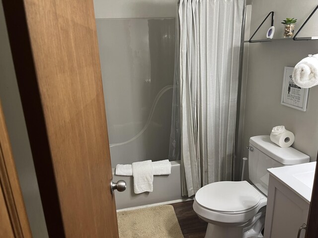 1076 Knollwood Dr, Tobyhanna, PA 18466 - bathroom with vanity, shower / bath combination with curtain, toilet, and wood finished floors