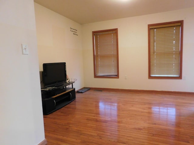 living area with wood finished floors