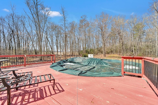 view of pool with a deck