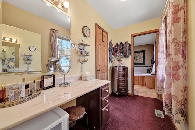 full bath with visible vents and vanity