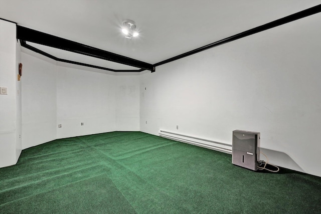 unfurnished room with beam ceiling, a baseboard heating unit, and carpet floors