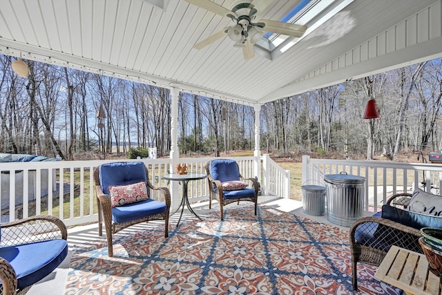 view of patio / terrace featuring a wooden deck and ceiling fan