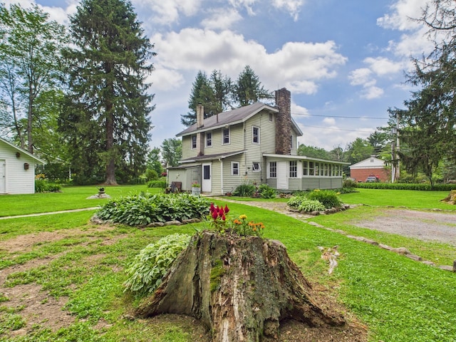 203 Old Rte 940, Pocono Pines, PA 18350 - view of front of house with a chimney and a front yard