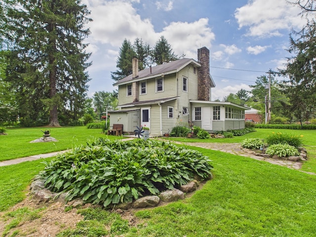 203 Old Rte 940, Pocono Pines, PA 18350 - rear view of property featuring a chimney and a lawn