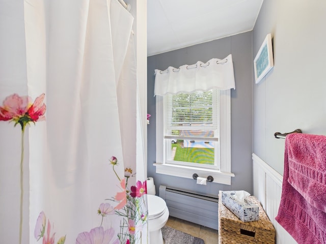 203 Old Rte 940, Pocono Pines, PA 18350 - bathroom featuring baseboard heating, tile patterned floors, and curtained shower