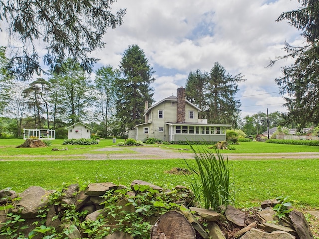 203 Old Rte 940, Pocono Pines, PA 18350 - view of side of home featuring a chimney and a yard