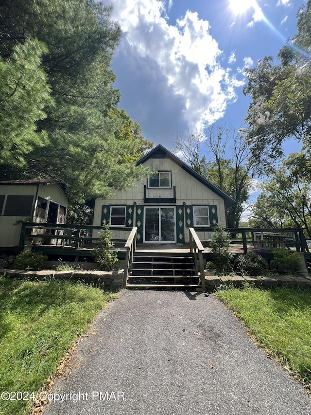 view of front of home with a deck