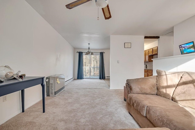 living area with light colored carpet and a ceiling fan