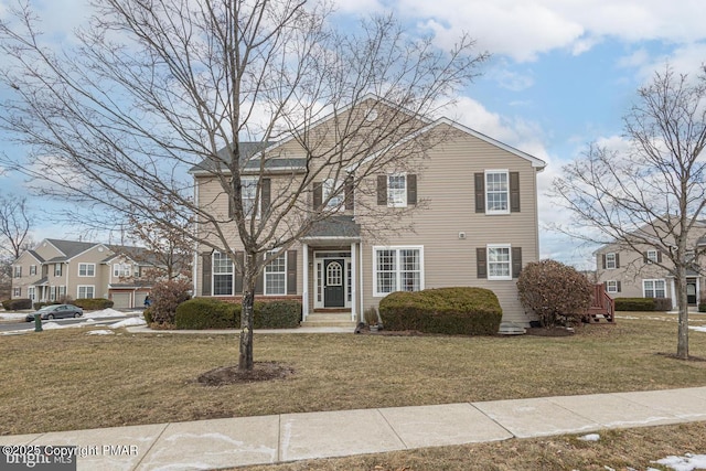 view of front of home with a front yard