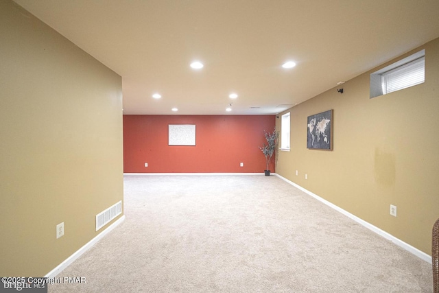 basement featuring carpet floors