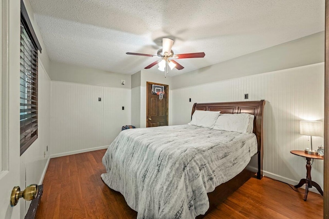 108 Bayberry Ct, Stroudsburg, PA 18360 - bedroom with wood finished floors, a textured ceiling, and a ceiling fan
