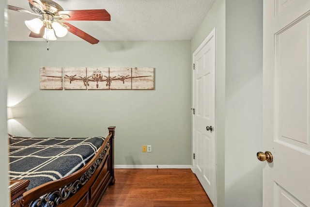 108 Bayberry Ct, Stroudsburg, PA 18360 - bedroom with wood finished floors, a ceiling fan, and a textured ceiling