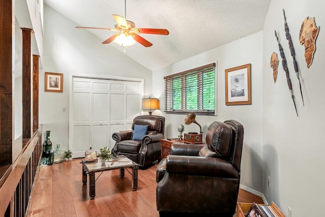 108 Bayberry Ct, Stroudsburg, PA 18360 - living room with ceiling fan, wood finished floors, a textured ceiling, and high vaulted ceiling