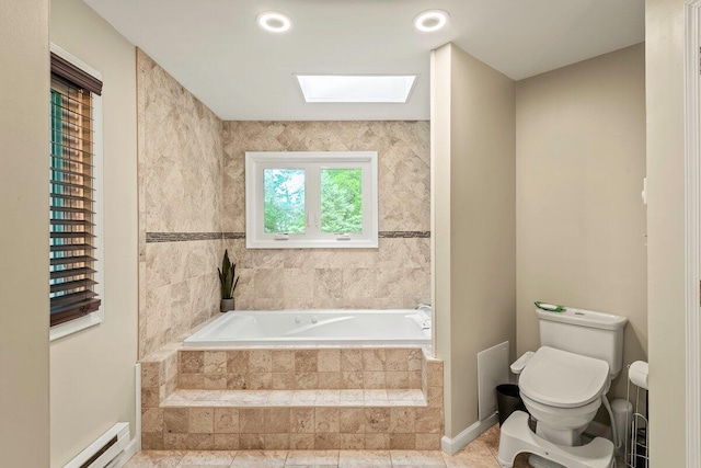 108 Bayberry Ct, Stroudsburg, PA 18360 - bathroom featuring a skylight, a garden tub, and a baseboard radiator