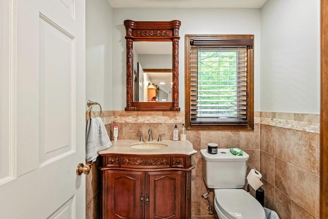 108 Bayberry Ct, Stroudsburg, PA 18360 - half bathroom featuring vanity and tile walls