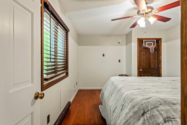108 Bayberry Ct, Stroudsburg, PA 18360 - bedroom featuring dark wood-style flooring, a textured ceiling, and ceiling fan
