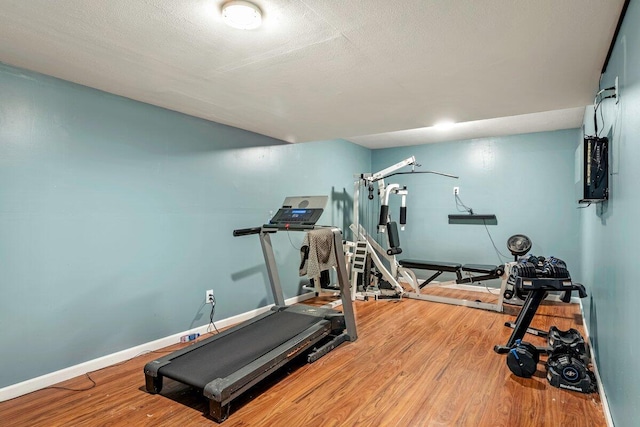 108 Bayberry Ct, Stroudsburg, PA 18360 - workout room featuring wood finished floors and baseboards
