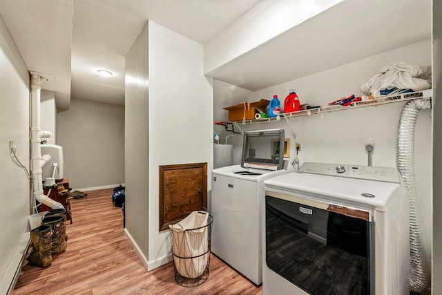 108 Bayberry Ct, Stroudsburg, PA 18360 - laundry area featuring washing machine and dryer and light wood-style floors