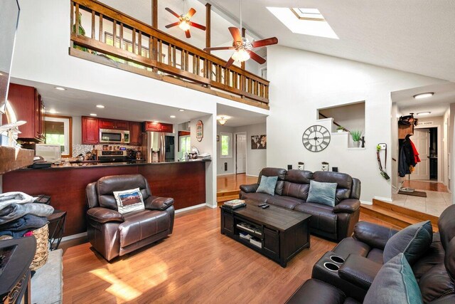 108 Bayberry Ct, Stroudsburg, PA 18360 - kitchen with appliances with stainless steel finishes, healthy amount of natural light, decorative backsplash, reddish brown cabinets, and recessed lighting