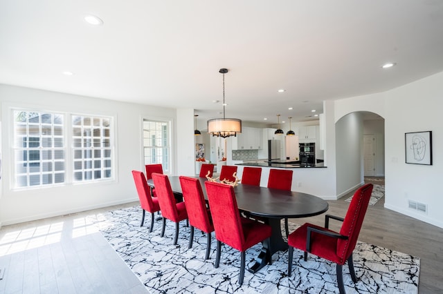 901 Meyer Rd, Nazareth, PA 18064 - dining room with light wood-type flooring, visible vents, arched walkways, and recessed lighting
