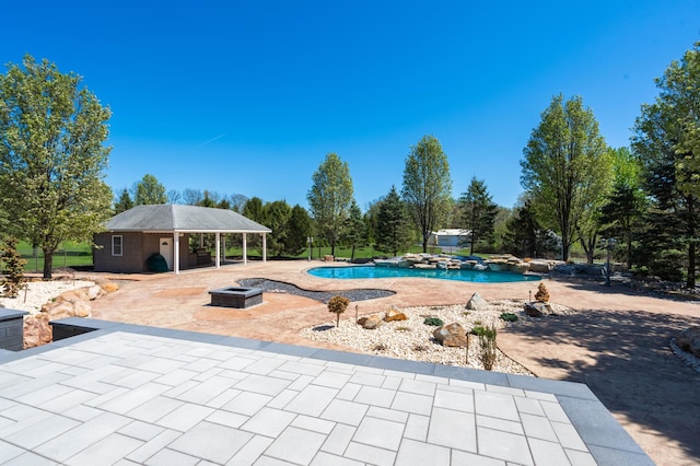 901 Meyer Rd, Nazareth, PA 18064 - pool with an outdoor fire pit, a patio area, and an outbuilding
