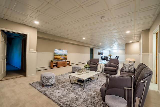 901 Meyer Rd, Nazareth, PA 18064 - living area featuring light colored carpet, a wainscoted wall, a baseboard radiator, and recessed lighting