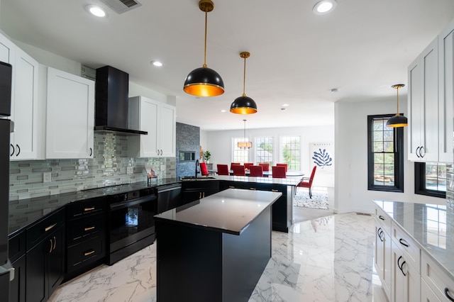901 Meyer Rd, Nazareth, PA 18064 - kitchen featuring a sink, a peninsula, wall chimney range hood, decorative backsplash, and wall oven