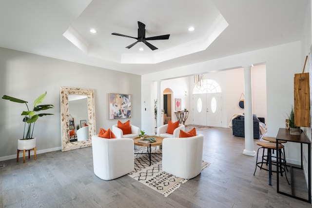 901 Meyer Rd, Nazareth, PA 18064 - living area with a raised ceiling, arched walkways, a ceiling fan, and wood finished floors