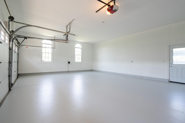 901 Meyer Rd, Nazareth, PA 18064 - garage with baseboards and a garage door opener