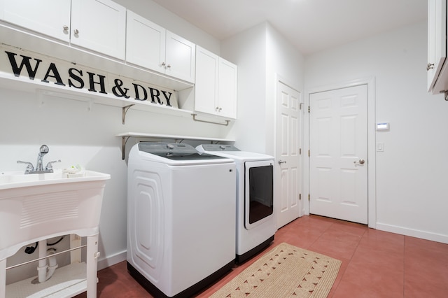 901 Meyer Rd, Nazareth, PA 18064 - clothes washing area featuring cabinet space, washing machine and clothes dryer, baseboards, and light tile patterned flooring