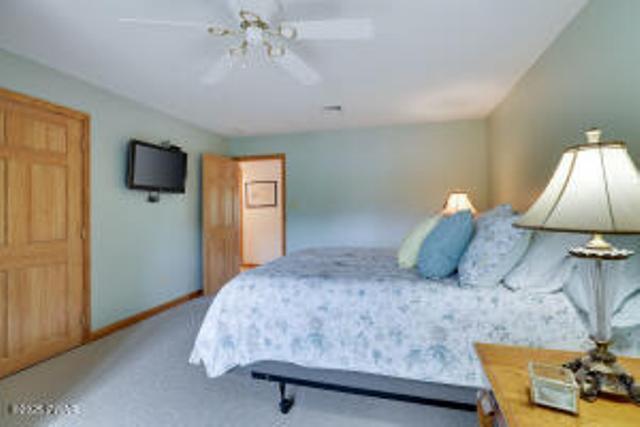 7 Shore Line Dr, Lakeville, PA 18438 - bedroom with carpet, baseboards, and ceiling fan