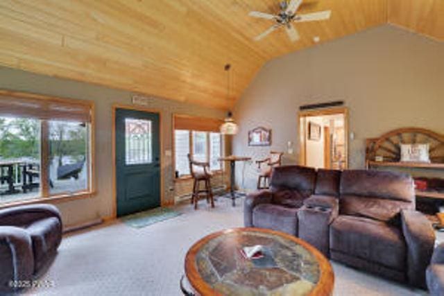 7 Shore Line Dr, Lakeville, PA 18438 - carpeted living area with vaulted ceiling, ceiling fan, and wooden ceiling