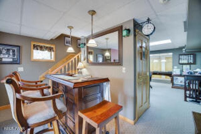 7 Shore Line Dr, Lakeville, PA 18438 - bar area with baseboards, stairs, and carpet floors