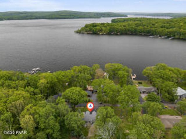 7 Shore Line Dr, Lakeville, PA 18438 - view of property location featuring a large body of water and a heavily wooded area