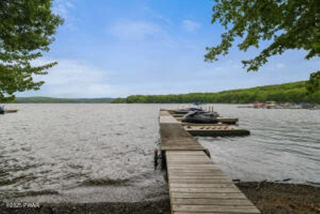 7 Shore Line Dr, Lakeville, PA 18438 - dock featuring a water view and a boat ramp